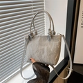 Minimalist light grey wrinkled leather tote bag with dual handles and slim shoulder strap - Silver