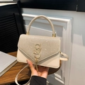 Chic beige crossbody bag with sparkling rhinestone flap and golden SS hardware - Gold