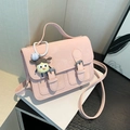 Pink vintage style crossbody satchel with cute girl charm and double buckle straps - With Pendant / Pink
