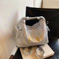 Borsa a tracolla grigio-blu chiaro con ricamo Hai giallo e dettaglio fiocco elegante - Grigio