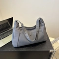 Dark grey canvas hobo bag with adjustable strap and front metal button pocket - Gray