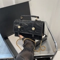 Chic black pleated leather handbag with gold chain strap and decorative metal buckles - Black