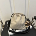 Beige pleated bucket bag with wide black strap and plush monster charm accessory - Khaki (No Pendant)