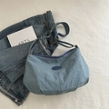 Blue crescent shoulder bag with adjustable strap and casual wrinkled nylon texture - Blue Without Charm