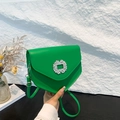 Chic green leather shoulder bag with triangular flap and sparkling crystal round buckle - Green
