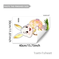 Detail view of Easter bunny wall sticker with gold foil egg and grass for room decoration - 30cmx40cm