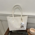 Off-white tote bag with marble texture and plush monster charm for casual styling - Off-White with Pendant