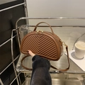 Caramel semi-circular crossbody bag with V-shaped quilting and golden zippers - Brown