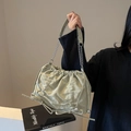 Light green pleated tote bag with metal chain strap and decorative bow accent - Green