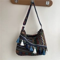 Ethnic bohemian woven shoulder bag featuring colorful geometric patterns and blue tassels - Colorful Woven Wave (Style 6)