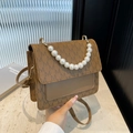 Brown vintage handbag with M-pattern monogram and elegant white pearl handle - Brown