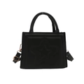 Fashionable black faux leather crossbody bag featuring a star pattern and gold hardware - Black
