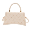White hourglass handbag with quilted heart embroidery and gold-tone metal hardware - White