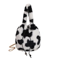 Plush bucket bag in cow print faux fur with drawstring closure and gold chain strap - Black and White Cow Dots