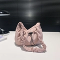 Pink pleated nylon shoulder bag with black drawstring and ruched strap for women - Pink