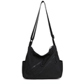 Large black multi-pocket crossbody bag with adjustable strap in casual nylon style - Black