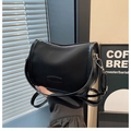 Detail of black matte nylon crescent bag with fashion label and metal zipper closure - Black without Pendant