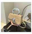 Detail showing beige pleated leather handbag with sculptural silver metal handle and strap - Khaki
