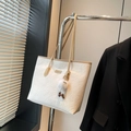 White tote bag with cartoon embossing and plush pendant for casual commute - With Charm / Khaki