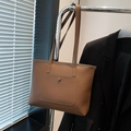 Brown leather tote bag with functional front snap pocket and slim shoulder straps - Brown