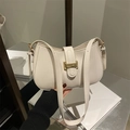 Chic beige crescent underarm bag with gold metal buckle and adjustable leather strap - White