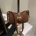 Chic brown leather crescent underarm bag with gold buckle and adjustable strap - Brown