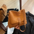 Vintage brown suede shoulder bag with flap closure and decorative metal buckle strap - Brown