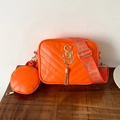 Vibrant orange quilted camera bag with gold logo, tassel, and wide jacquard strap - Orange