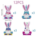 Detailweergave van 12 Pasen gnome decoratieve kaarten met bloemen- en stippenpatronen - Pasen Driehoekige Doos (S921)
