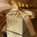 Sparkling champagne gold wedding favor box with satin bow and golden charm detail - Small / Gold With Gold Ribbon And Wedding Character