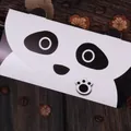 Creative panda-shaped greeting card envelope with cute paw fastener on wood background - Cartoon Panda Style (002#信封熊猫)