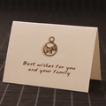 Vintage bronze Scottish Terrier dog pendant on cream gift card with festive greeting - Dog