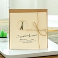 Vintage kraft paper greeting card with Eiffel Tower bronze charm and hemp rope bow - Tower Style