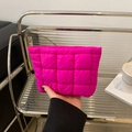 Chic quilted puffer cosmetic bag in rose red nylon featuring a sleek envelope design - Rose Red