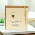 Vintage kraft paper greeting card with bronze tree charm and jute rope detail - 319# Lucky Tree