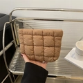 Quilted coffee brown puffy clutch bag in minimalist style with large check pattern - Khaki
