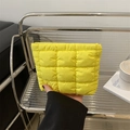 Quilted square pattern cosmetic clutch bag in vibrant yellow nylon with a soft puffy feel - Yellow