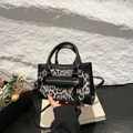 Chic leopard print small square bag with black leather trim and motorcycle style detail - Black