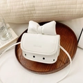 White mini crossbody bag for girls with large bow and black polka dot pattern - White