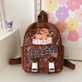 Brown canvas kids backpack featuring three cartoon capybaras and white plastic buckles - Coffee
