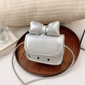 Metallic silver mini crossbody bag for girls with large bow and embossed logo - Silver