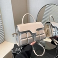 Elegant beige crossbody handbag with quilted chocolate block texture for women - White