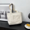 Large capacity tote bag in cream faux shearling with fashion label and canvas handles - White