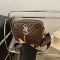 Dark brown quilted crossbody bag with gold S buckle and patterned wide shoulder strap - Coffee