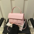 Light pink structured square handbag with relief grid pattern and gold hardware finish - Pink