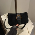 Elegant matte black shoulder bag featuring a vintage gold buckle and smooth leather sides - Black