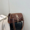 Retro dark brown crossbody bag with crocodile pattern and golden tassel detail - Coffee