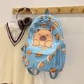 Light blue Capybara cartoon backpack with large capacity and ergonomic design for students - Blue