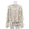 French style floral blouse with ruffles and lace-up bell sleeves on white mannequin - S / Beige