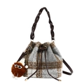 Plaid wool bucket bag with woven handle and plush charm on white background - Single Bag / Brown